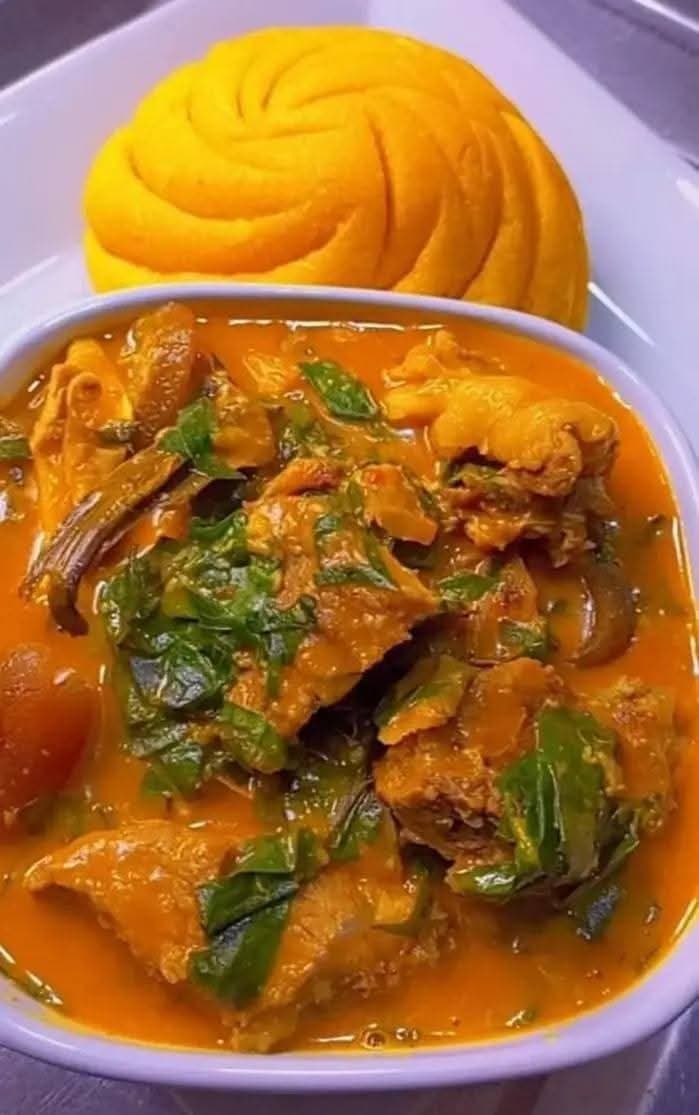 Eba served with a rich native soup